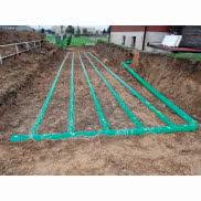 Gruntowy wymiennik ciepła GLOBAL na zewnątrz domu jednorodzinnego